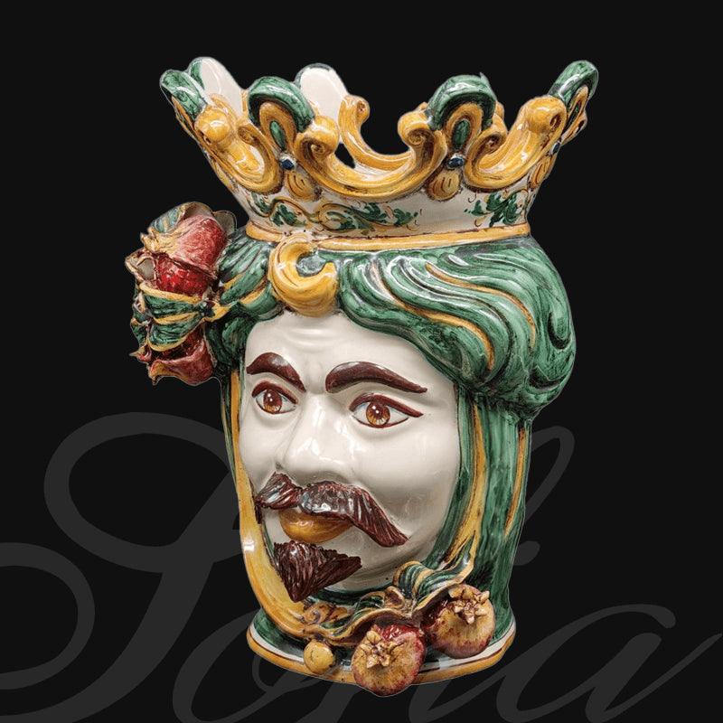 Ceramiche di Caltagirone fatti a mano con volto regale e corona colorata