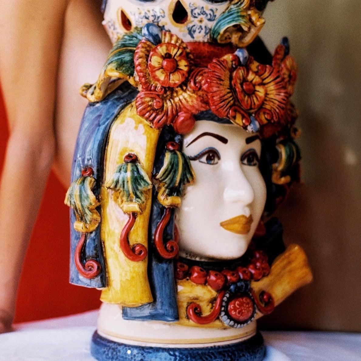 Handcrafted Teste di Moro ceramic bust with vibrant floral crown and ornate details, blending tradition and modern design.