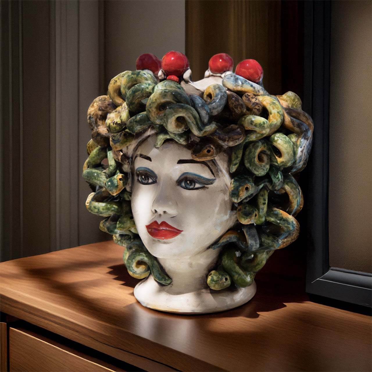 Handmade Teste di Moro ceramic sculpture with snake hair and red accents, modern home decor