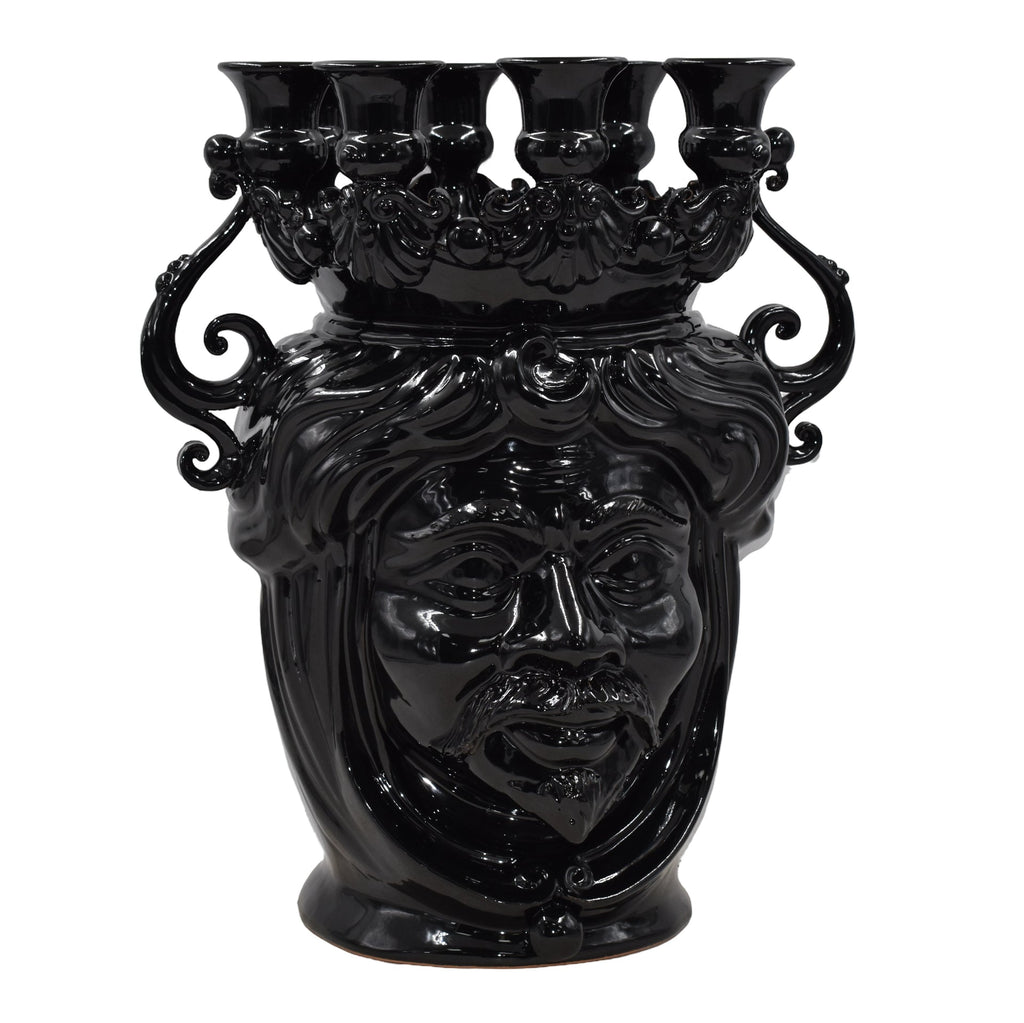 Black ceramic Teste di Moro vase with sculpted face, ornate crown, and five openings for home decor