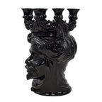 Black ceramic Testa di Moro candle holder with ornate crown and flowing hair, handmade decorative piece