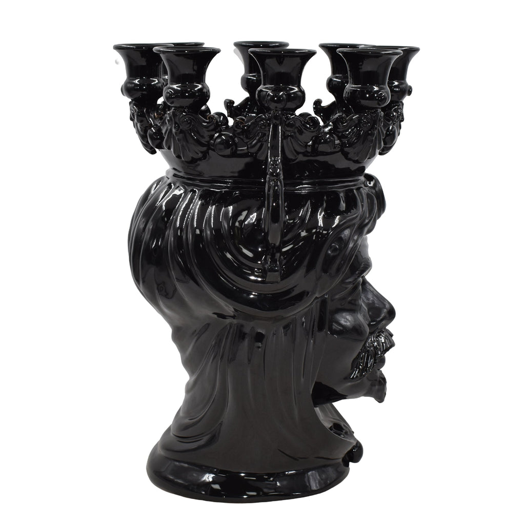 Black ceramic Teste di Moro candle holder with ornate crown and multiple arms, handmade decorative piece